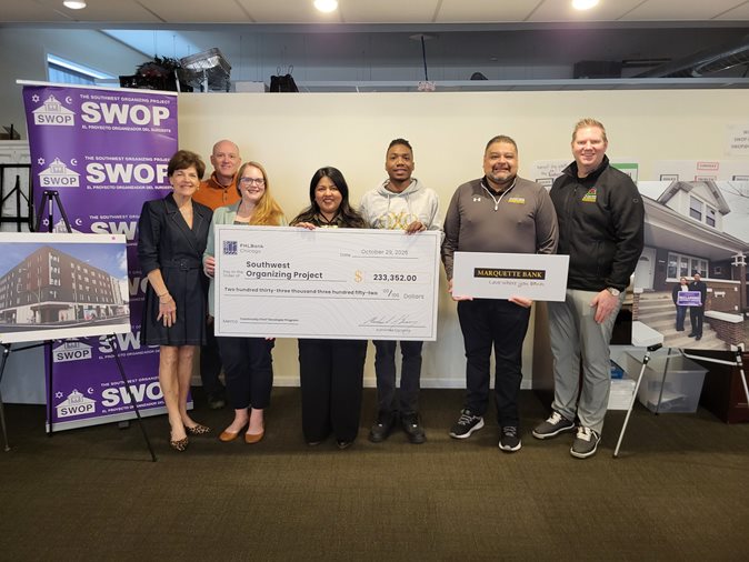 Representatives from Southwest Organizing Project accepting the funding from Community First® Developer Program